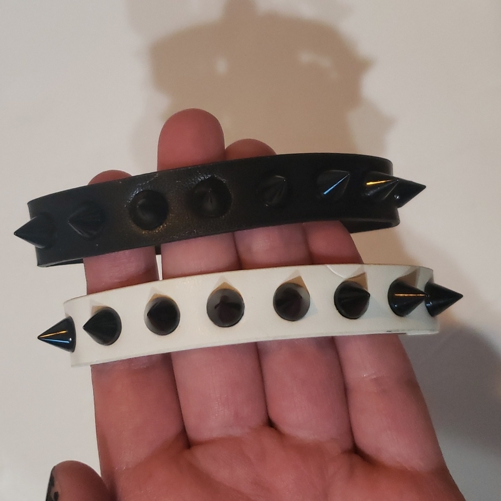 Black and white leather spikes bracelets
